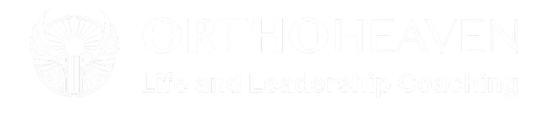 OrthoHeaven Logo for OrthoHeaven Life and Leadership Coaching, featuring stylized wings and a radiant sunburst beside the OrthoHeaven name in bold text. Freedom Mapping
